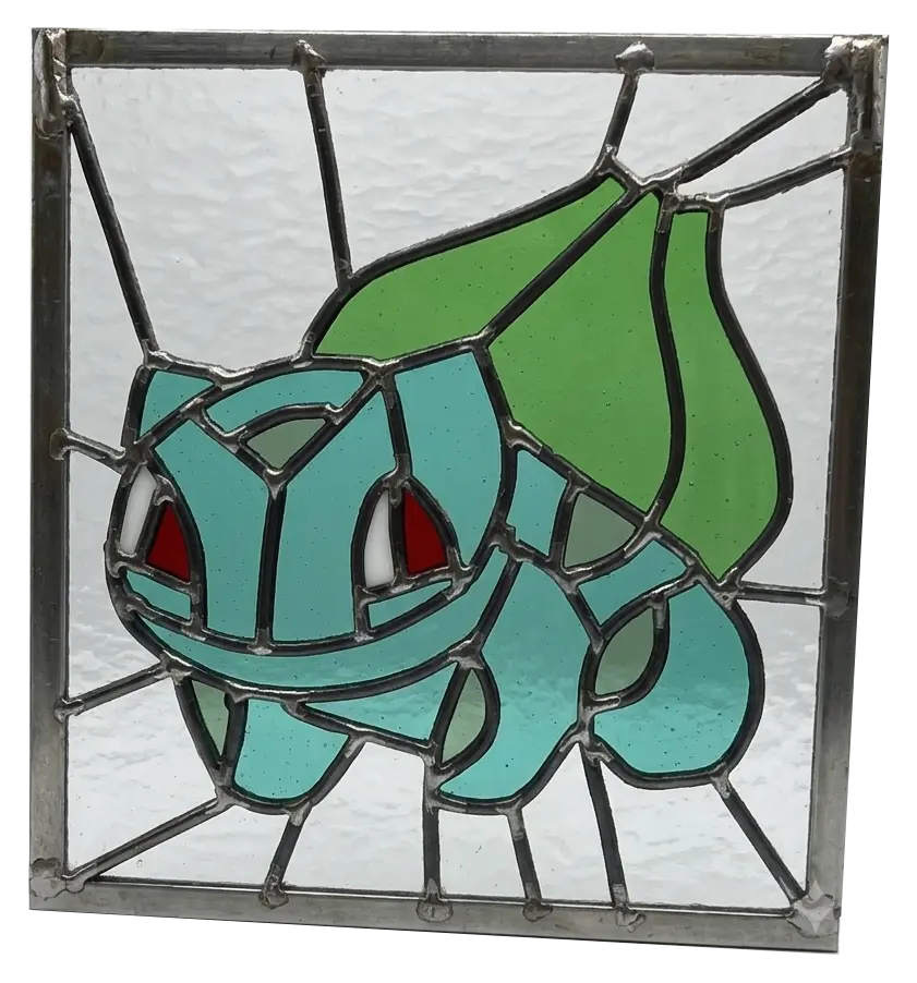 A stained glass window depicting Bulbasaur.